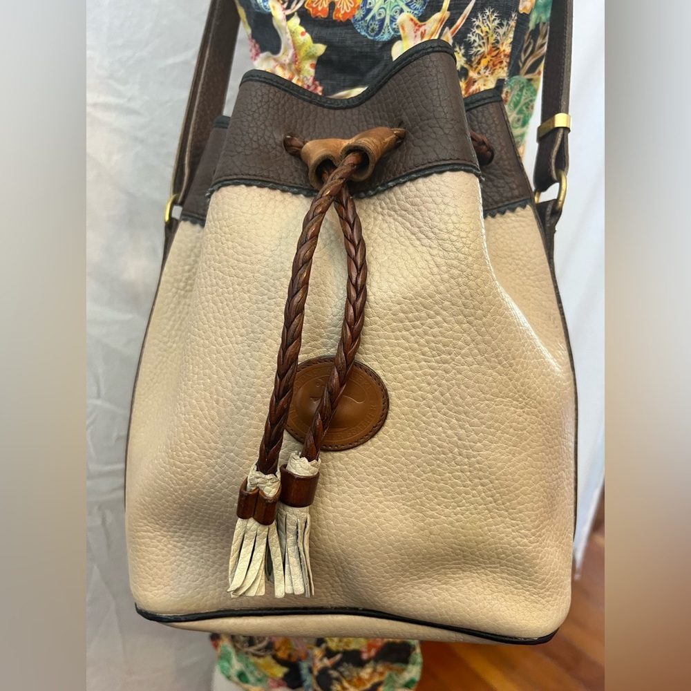 Cool! Dooney & Bourke brown leather bucket bag